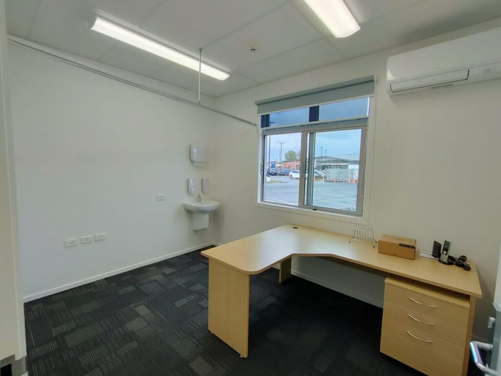 10 Murray Place - consult room with desk and hand basin